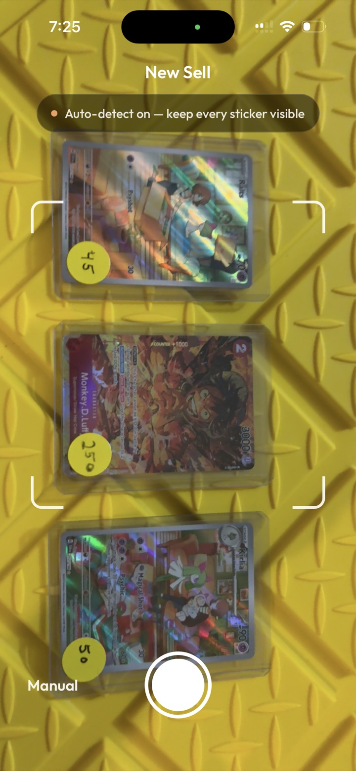 Camera reading price stickers on three cards